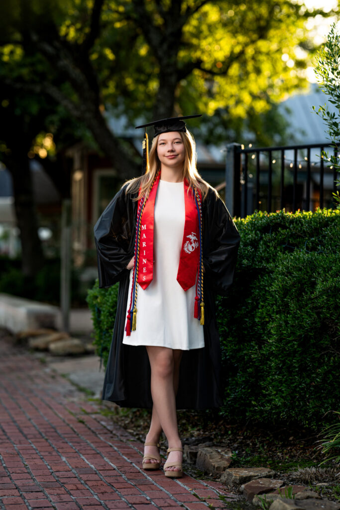 Picture of a high school senior during a Spring photo session in Ole Town Spring, Texas.