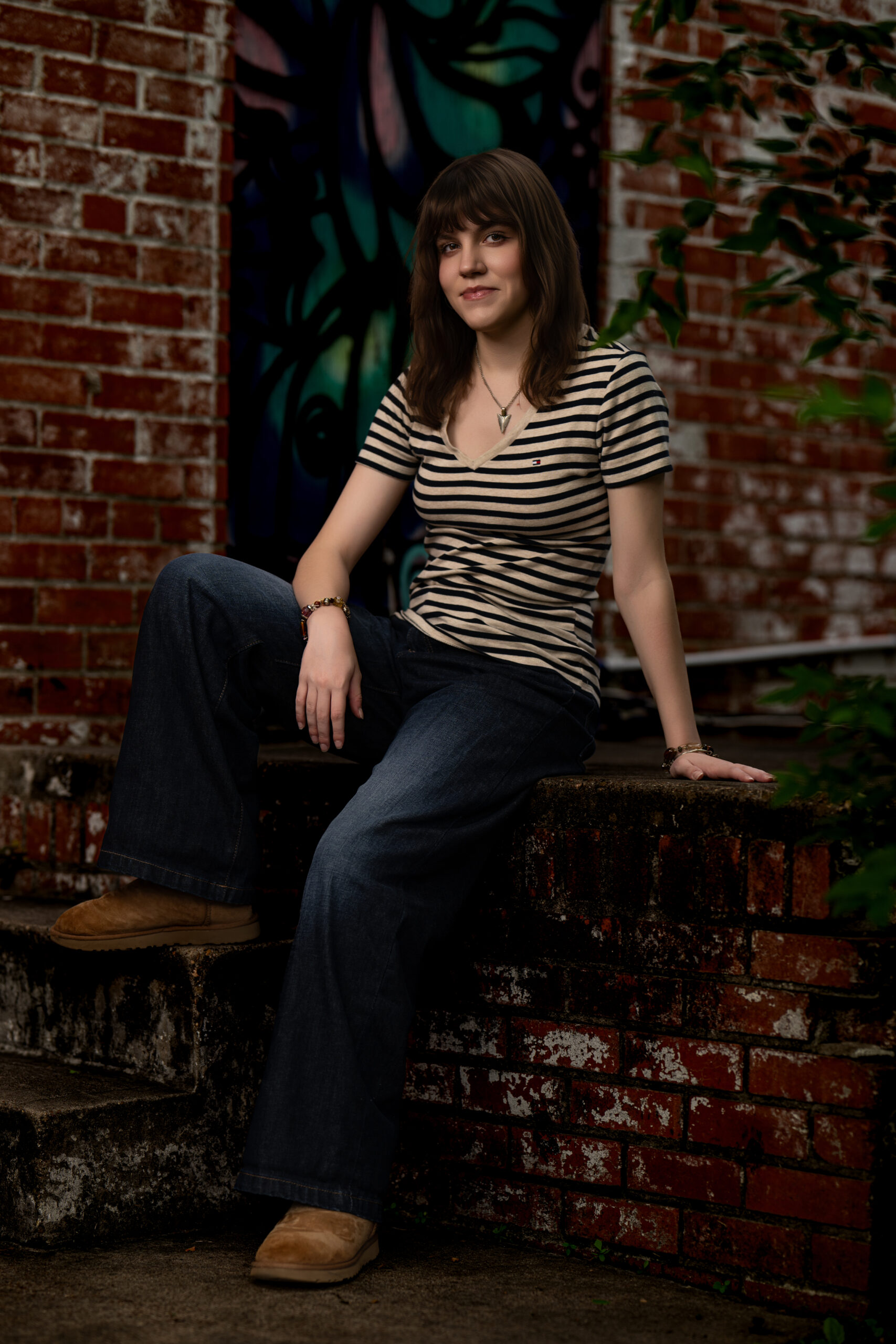 Senior Photographer Atascocita, Texas | $250 2 A picture of a high senior sitting on a brick staircase near Atascocita, Texas.