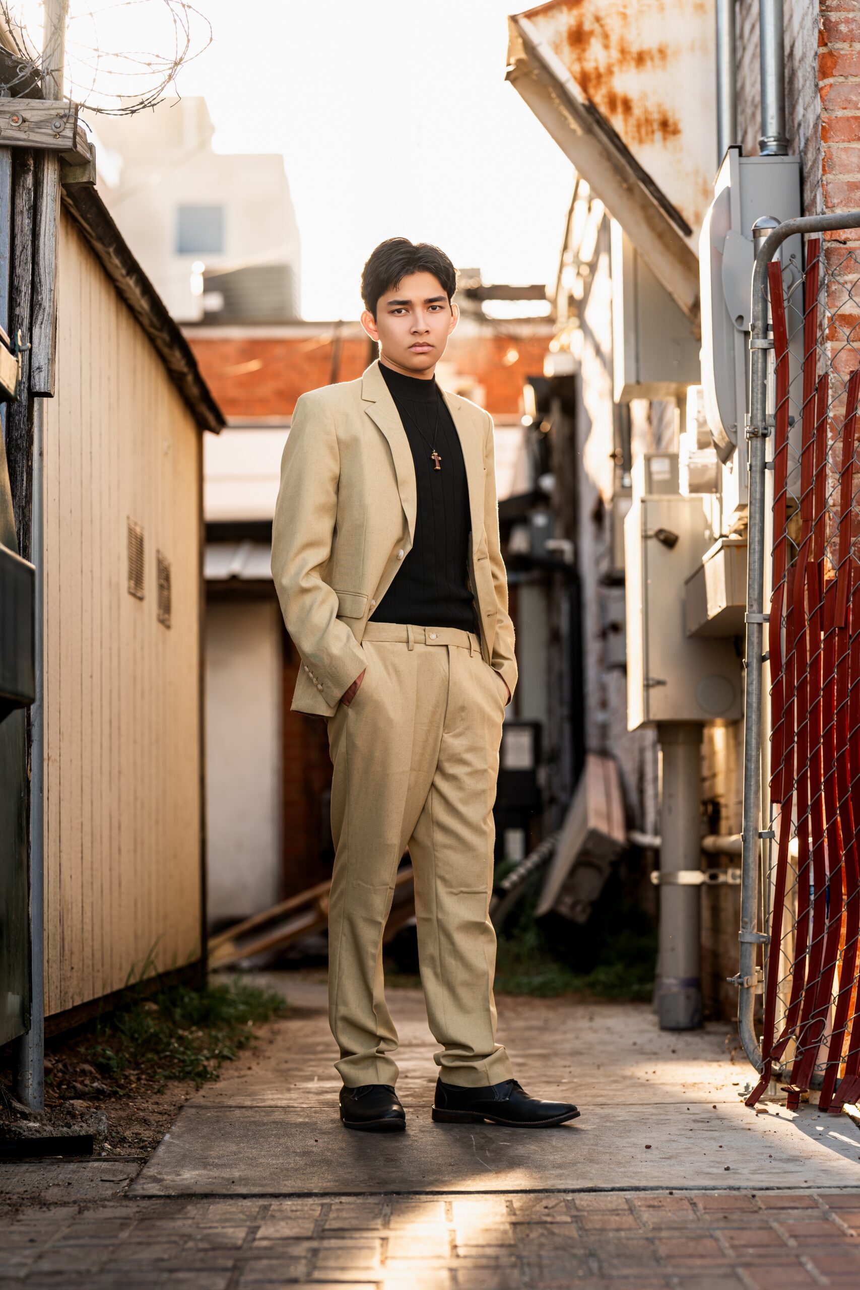 A picture of a senior high student standing in an alleyway near New Caney, Texas.