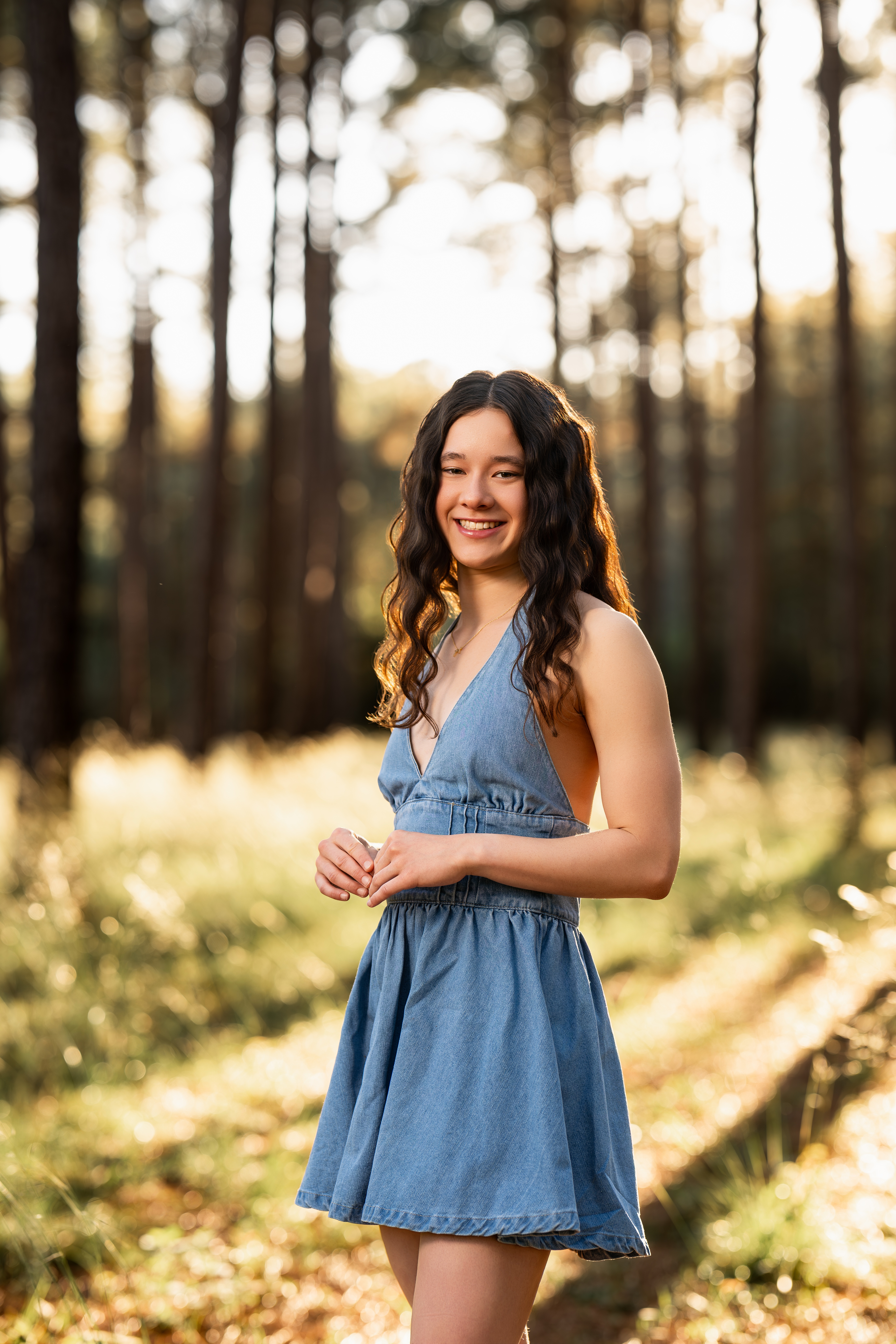 A picture of a senior high athlete during her senior portrait session near Cleveland, Texas.